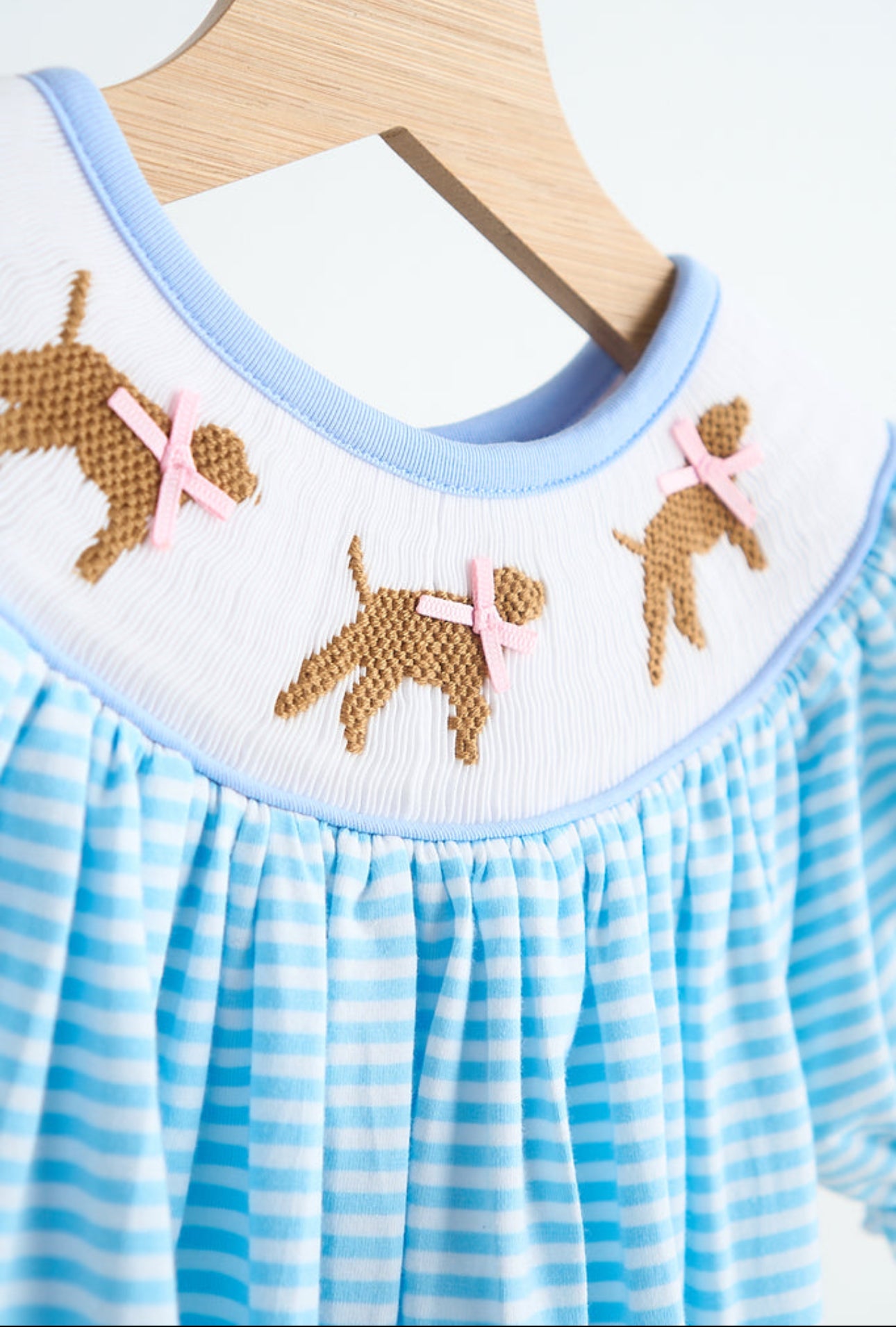 Blue puppy hand smocked girl romper - 12m